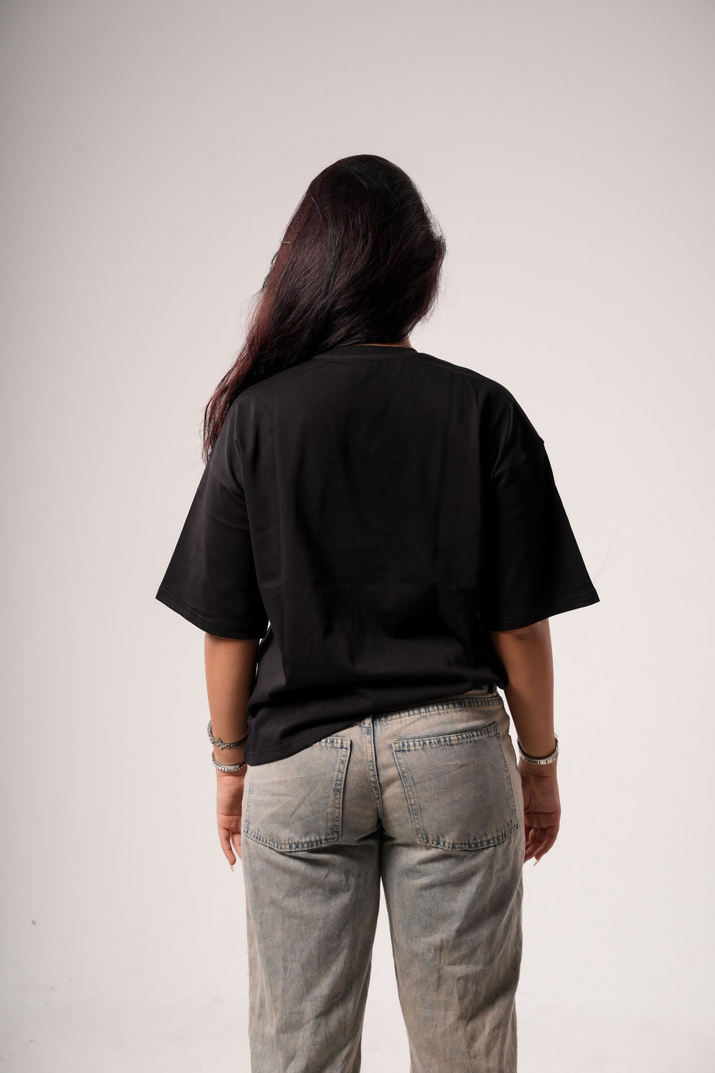"NOTHING FEELS REAL" STATEMENT TEE