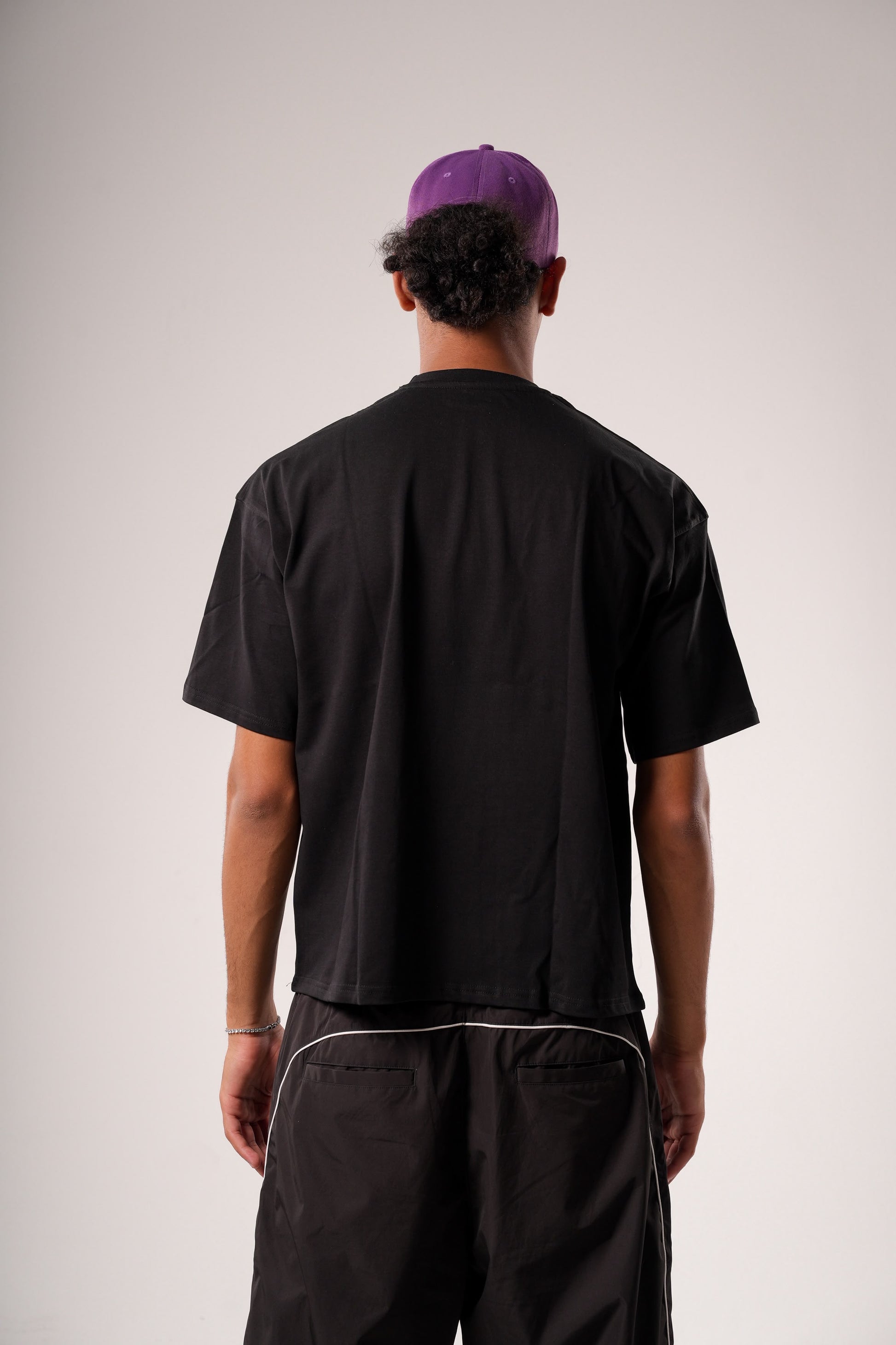 "NOTHING FEELS REAL" STATEMENT TEE
